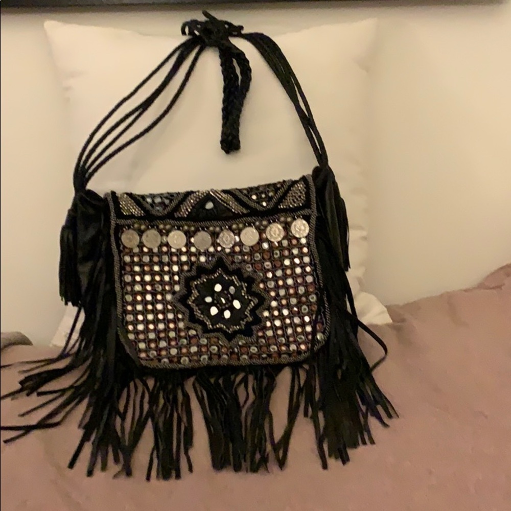 Black leather Fringed Crossbody bag.